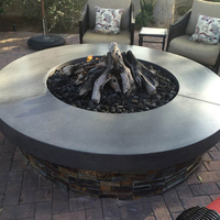 Customer fire pit with lava rock and gas logs